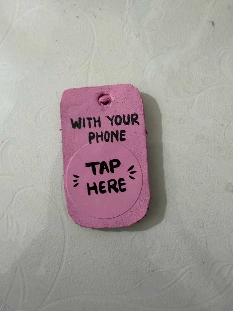 The hand-lettered back: with your phone, tap here